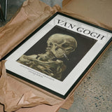 Head of a skeleton with a burning cigarette