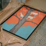 Goats in an Orange Tree