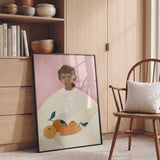 Woman Holding Oranges