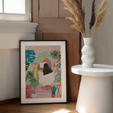 Woman taking bath in pink tropical bathroom